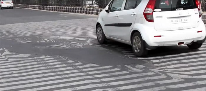 فيديو : موجة حر عنيفة تذيب الطرق وتقتل 1300 شخص في الهند !!